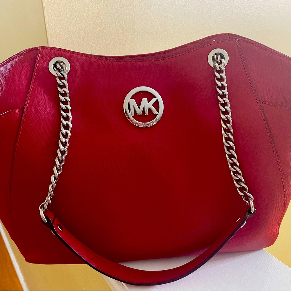 Michael Kors leather bag with silver chain handles.